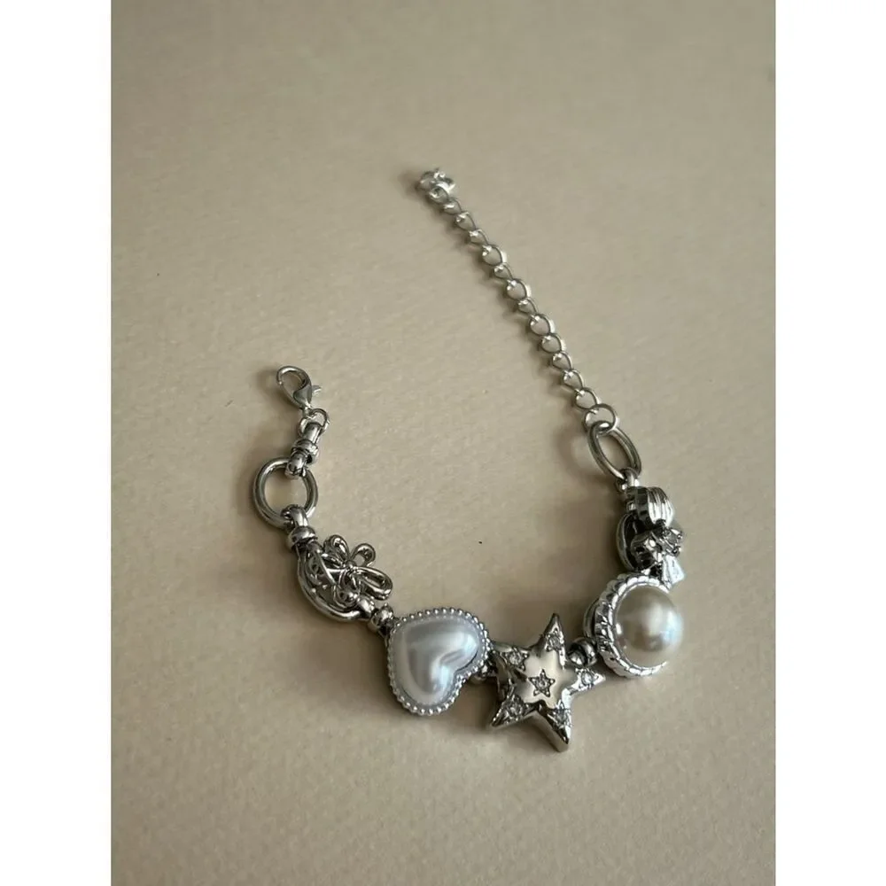 Anthropologie elegant silver
